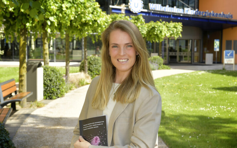 Researcher Justine van der Beek in front of the WKZ.