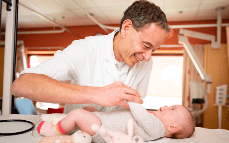 Louis Bont with a baby
