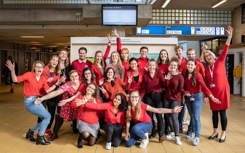 Colleagues wearing red