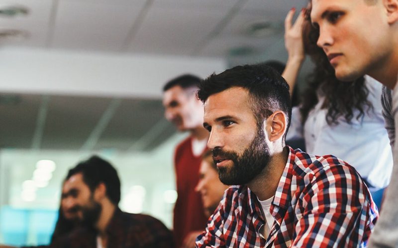 People looking at a computer screen