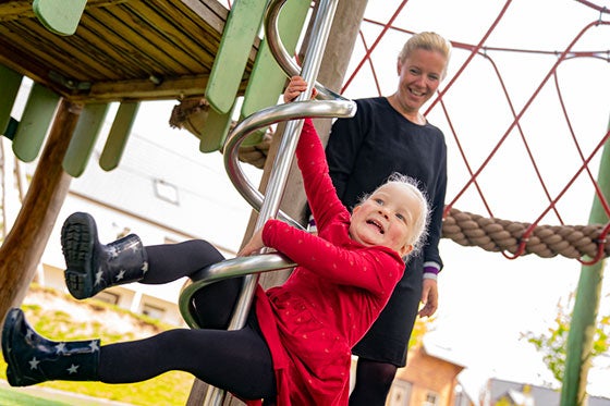 Child and mother in playground