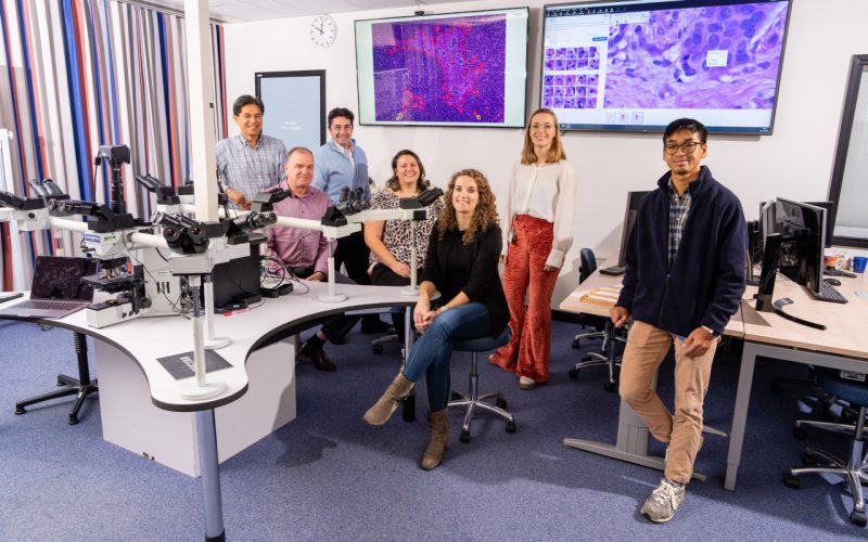 Pathology research group in their office.