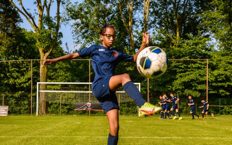 A child playing soccer