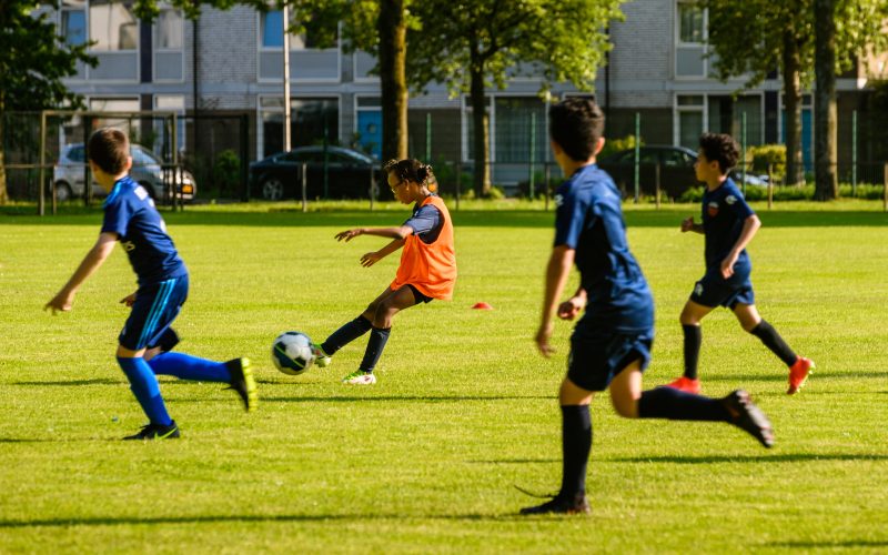 Children playing soccer