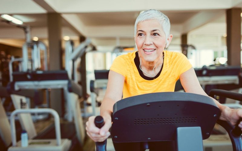 Woman on fitness equipment