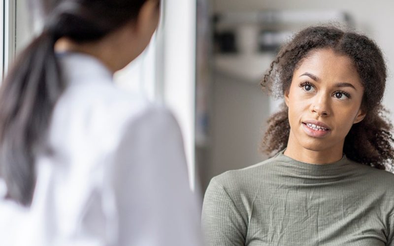 Women in conversation with doctor