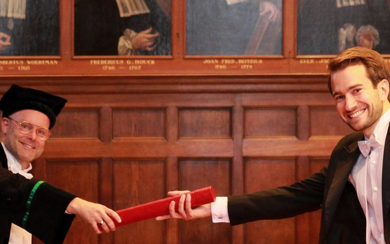 Picture of Bart receiving his PhD