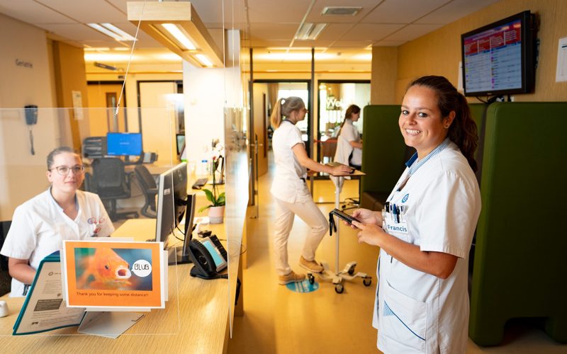 healthcare professionals smiling at the camera
