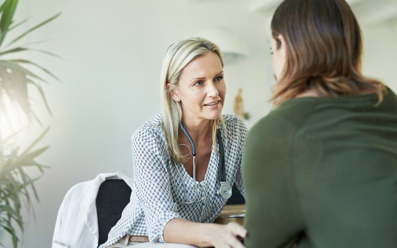 Doctor talking to a woman